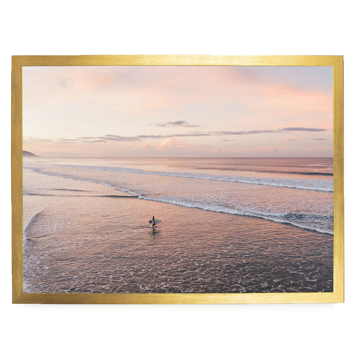 Lone Surfer on a Pink Beach II, Costa Rica print in a gold frame without mat