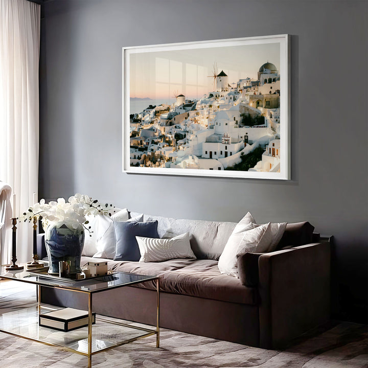Sunset in Oia IV, Santorini, Greece print displayed in a bedroom setting
