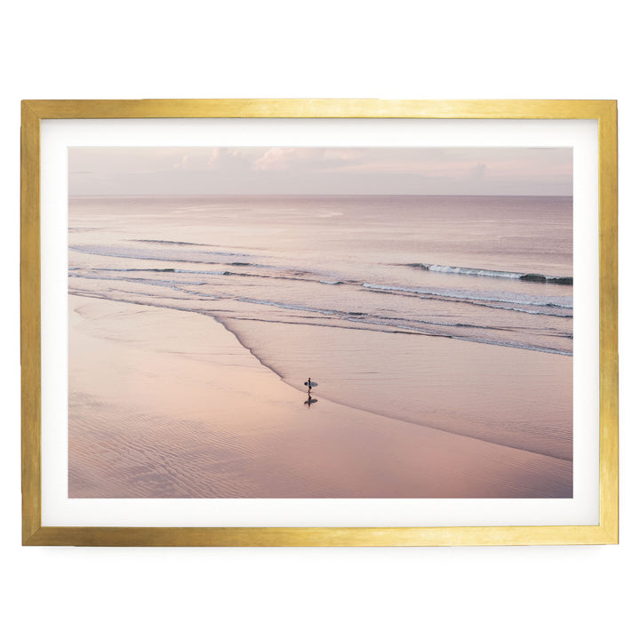 Lone Surfer on a Pink Beach I, Costa Rica print in a gold frame with white mat