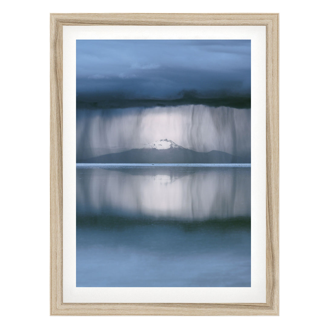 Storm over Salar de Uyuni I, Bolivia fine art print in a natural wood frame with white mat