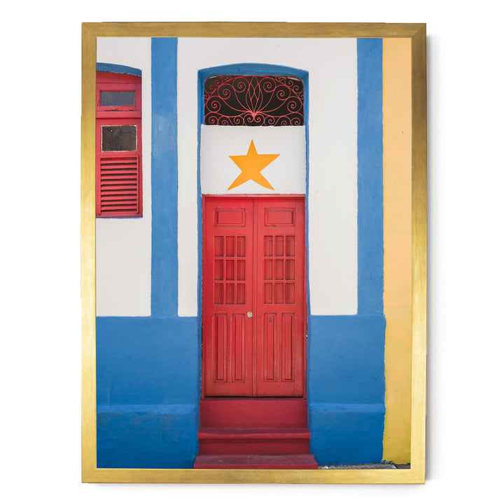 Red Door with Yellow Star, Olinda, Brazil print in a gold frame without mat