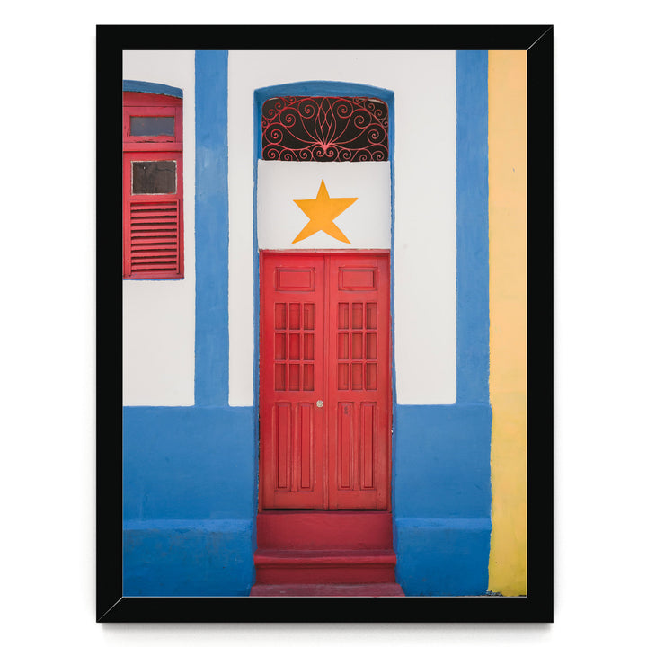 Red Door with Yellow Star, Olinda, Brazil print in a black frame without mat