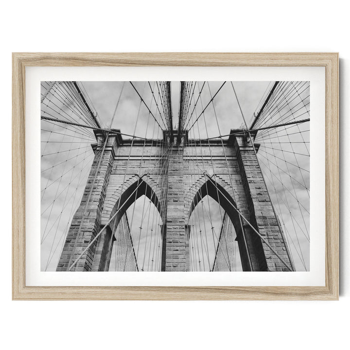 Brooklyn Bridge Tower, New York City – B&amp;W fine art print in a natural wood frame with white mat