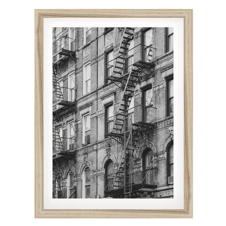 Fire Escapes, New York City – B&amp;W fine art print in a natural wood frame with white mat