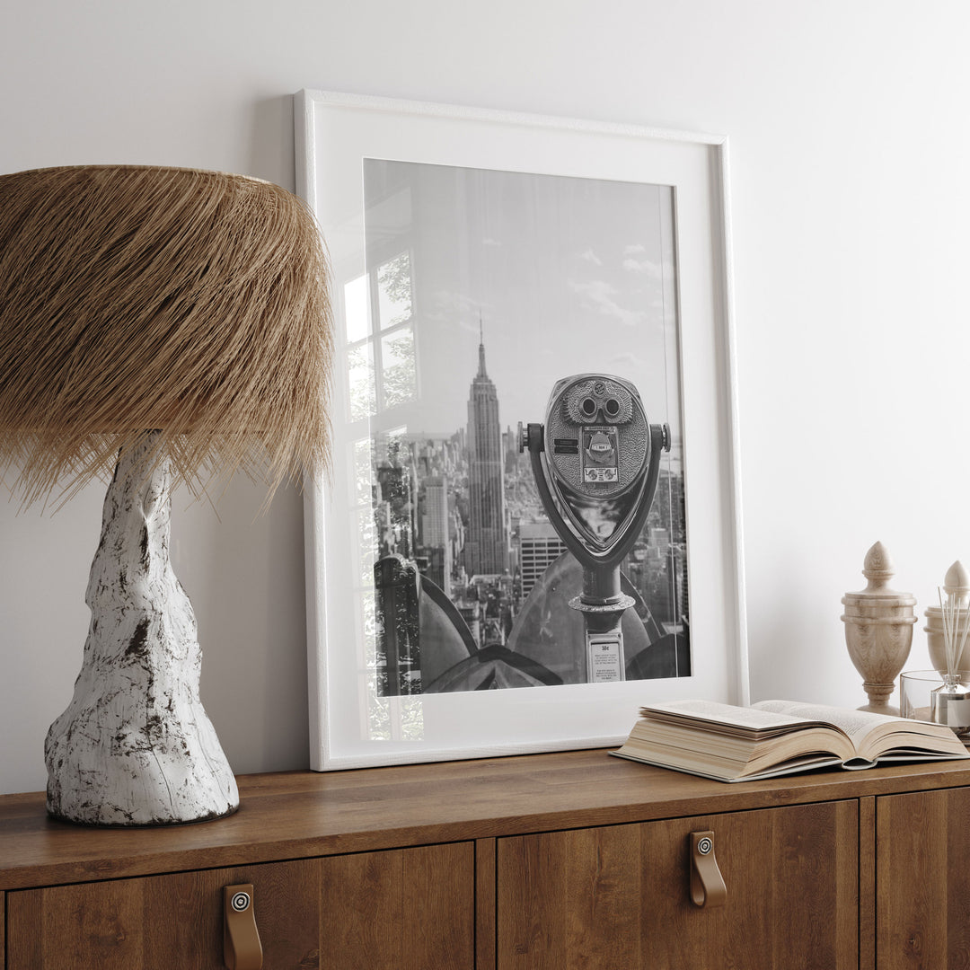 Binoculars and Empire State Building, New York City – B&amp;W wall art displayed in a room setting