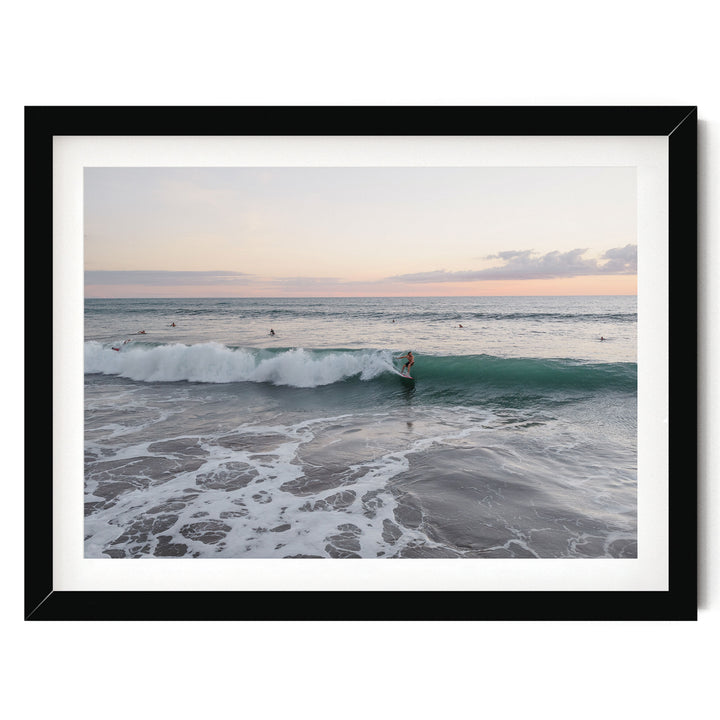 Riding the Wave at Sunset II, Costa Rica print in a black frame with white mat