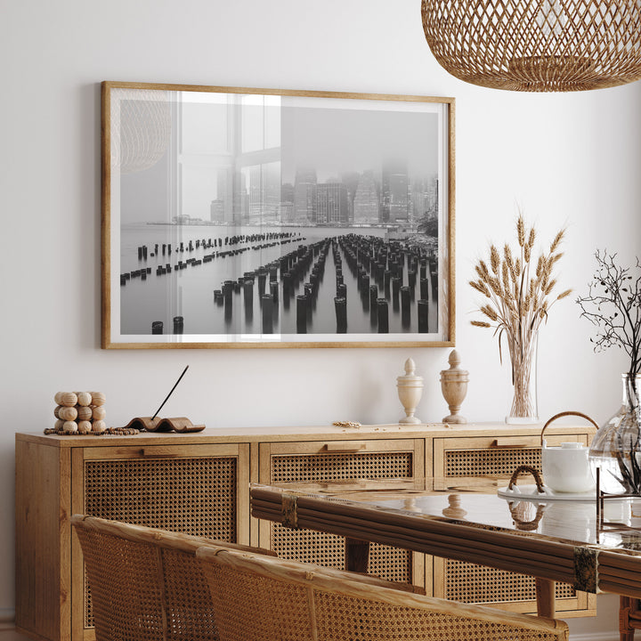 Foggy Manhattan Skyline, New York City – B&amp;W framed print hanging in a styled interior