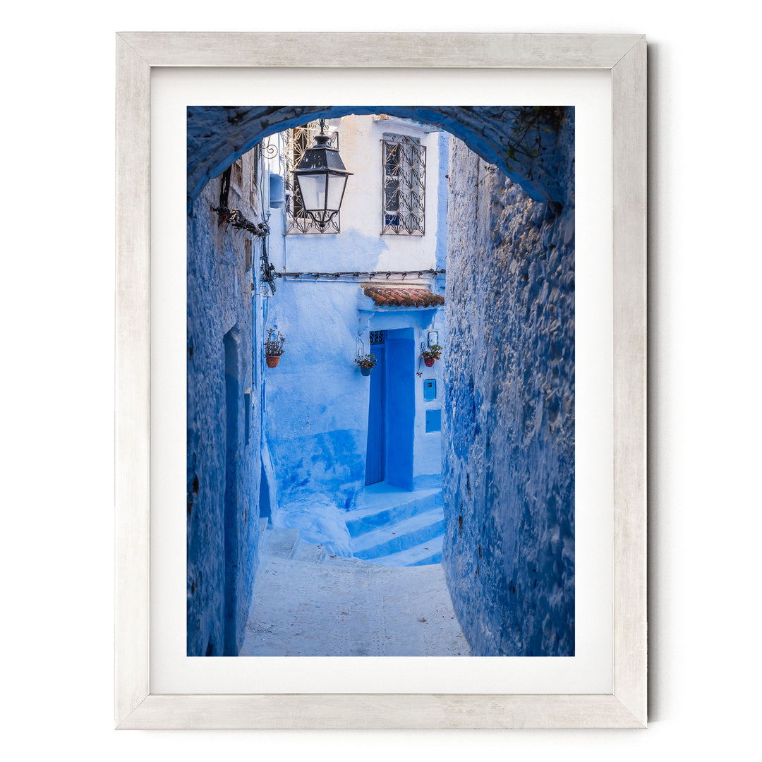 Blue Alley with Lantern, Chefchaouen, Morocco print in a silver frame with white mat