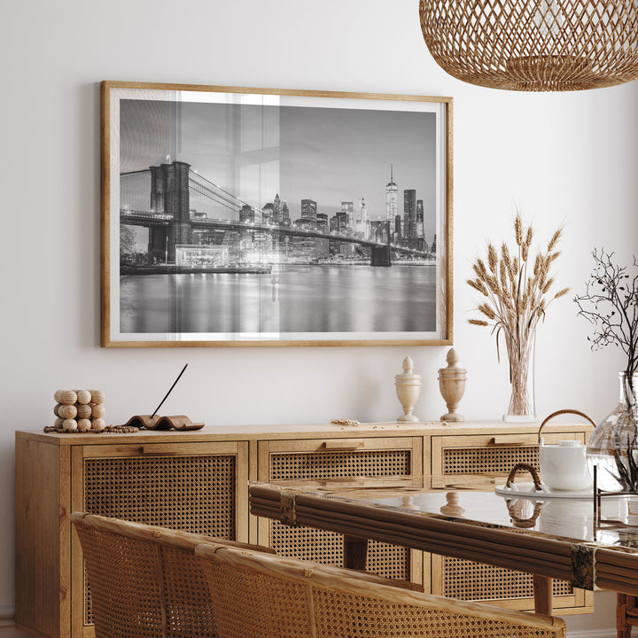 Brooklyn Bridge and Skyline at Dusk, New York City – B&amp;W framed print hanging in a styled interior