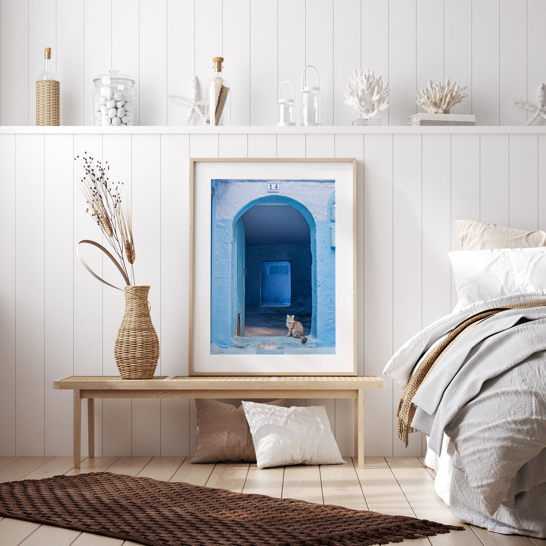 Cat in the Blue Doorway, Chefchaouen, Morocco framed wall art in a home interior
