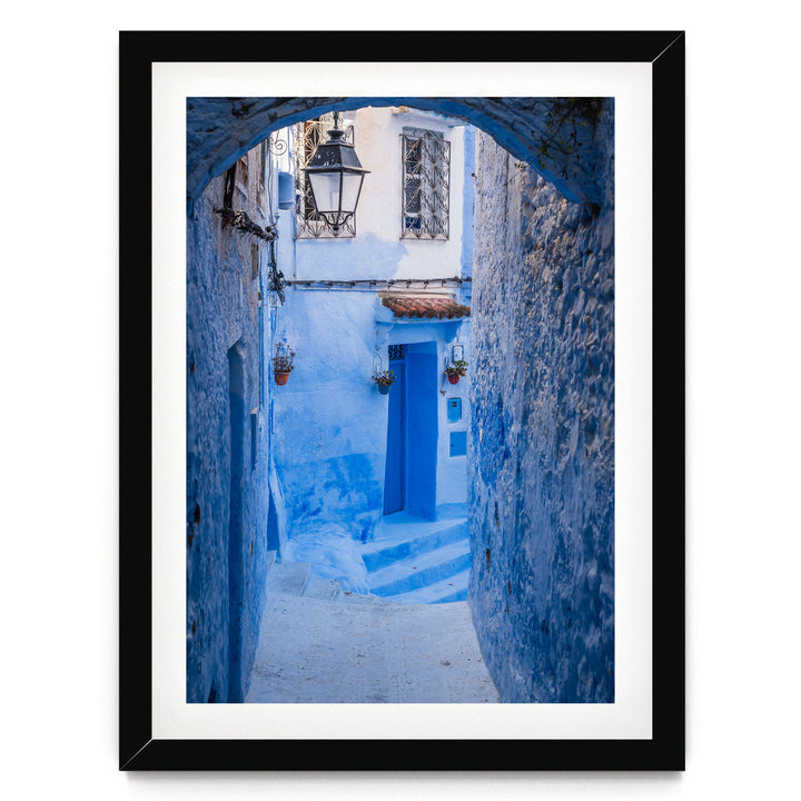 Blue Alley with Lantern, Chefchaouen, Morocco print in a black frame with white mat