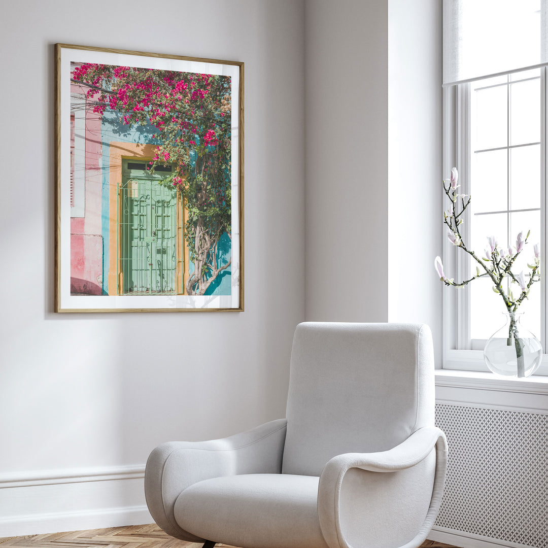 Bougainvillea and Green Door I, Olinda, Brazil framed wall art in a cozy interior