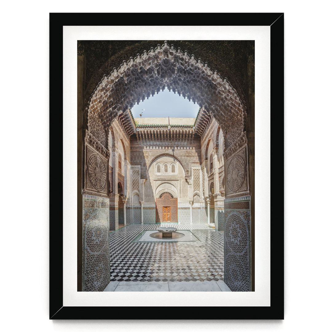 Ornate Madrasa Archway, Fes, Morocco print in a black frame with white mat