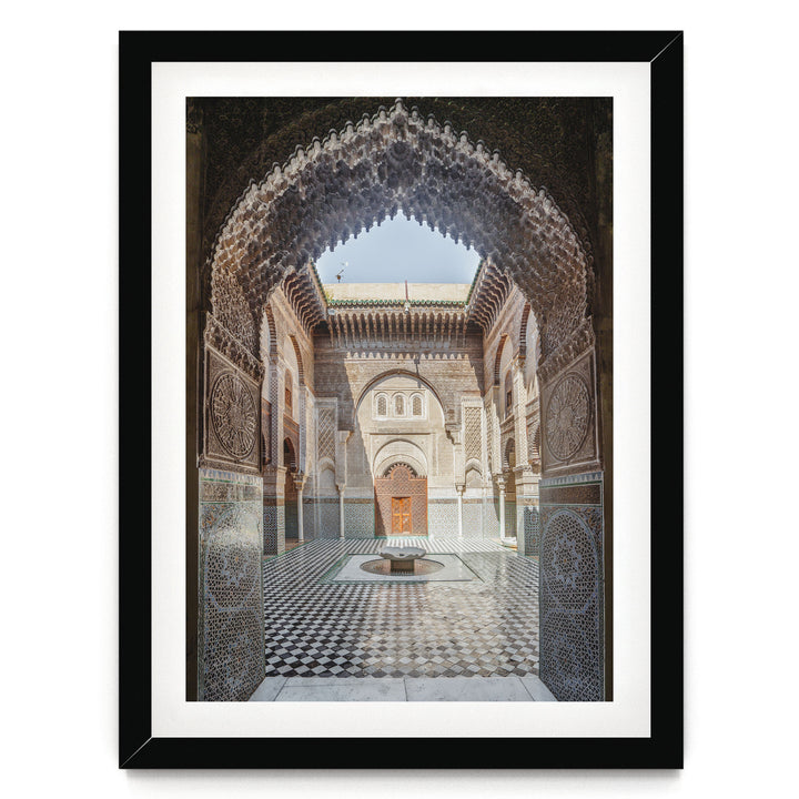 Ornate Madrasa Archway, Fes, Morocco print in a black frame with white mat
