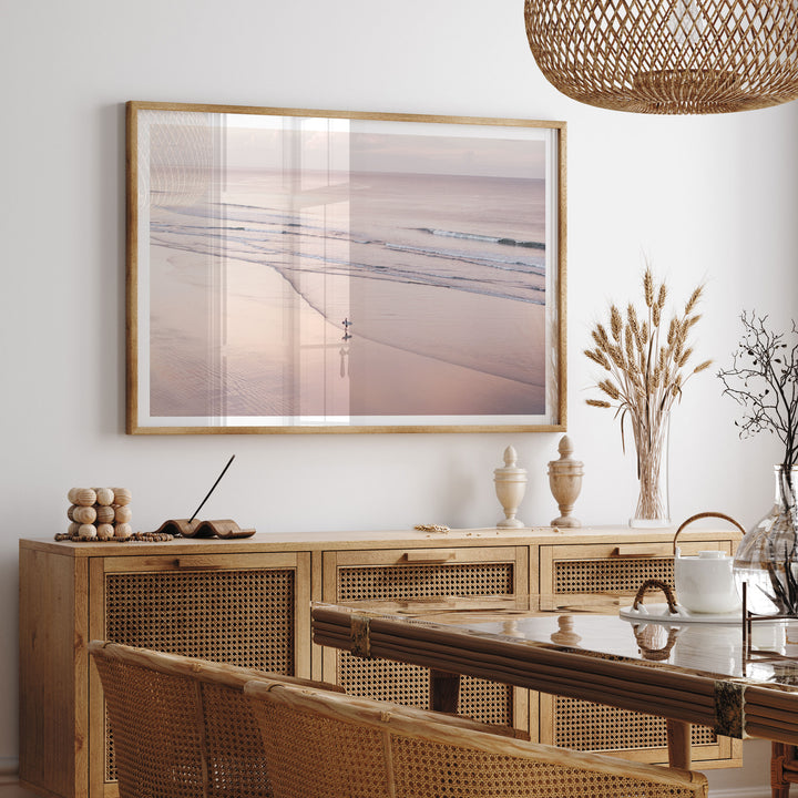 Lone Surfer on a Pink Beach I, Costa Rica framed print hanging in a styled interior