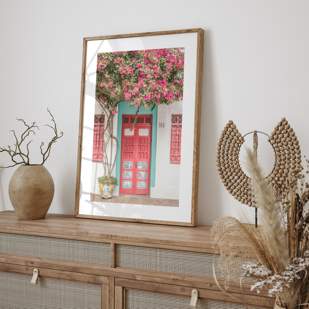 Bougainvillea and Red Door, Olinda, Brazil framed print styled on the wall