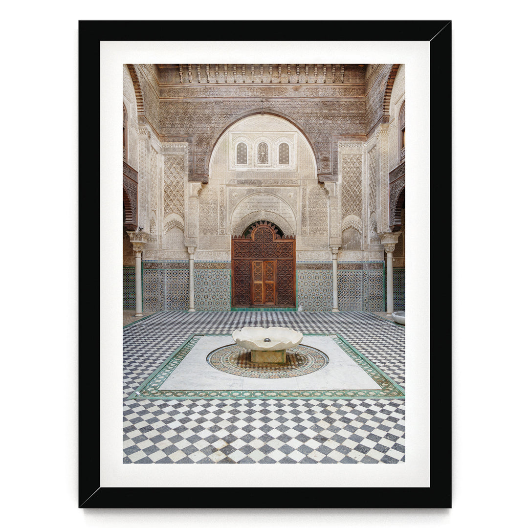 Madrasa Courtyard, Fes, Morocco print in a black frame with white mat
