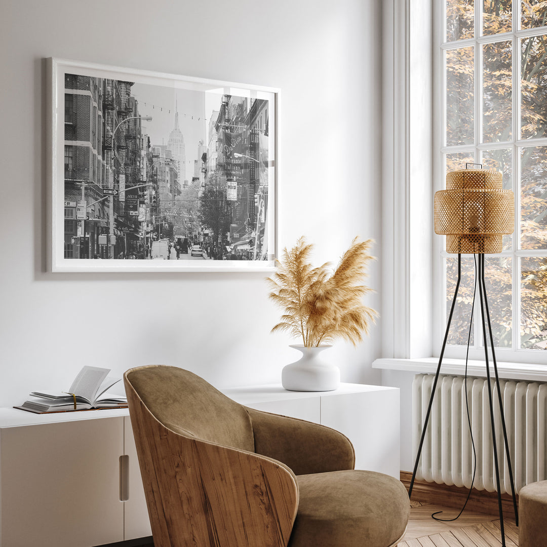 Little Italy and Empire State Building, New York City – B&amp;W wall art displayed in a room setting