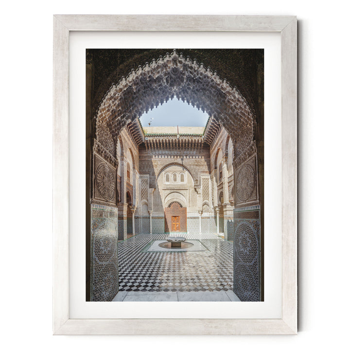 Ornate Madrasa Archway, Fes, Morocco print in a silver frame with white mat