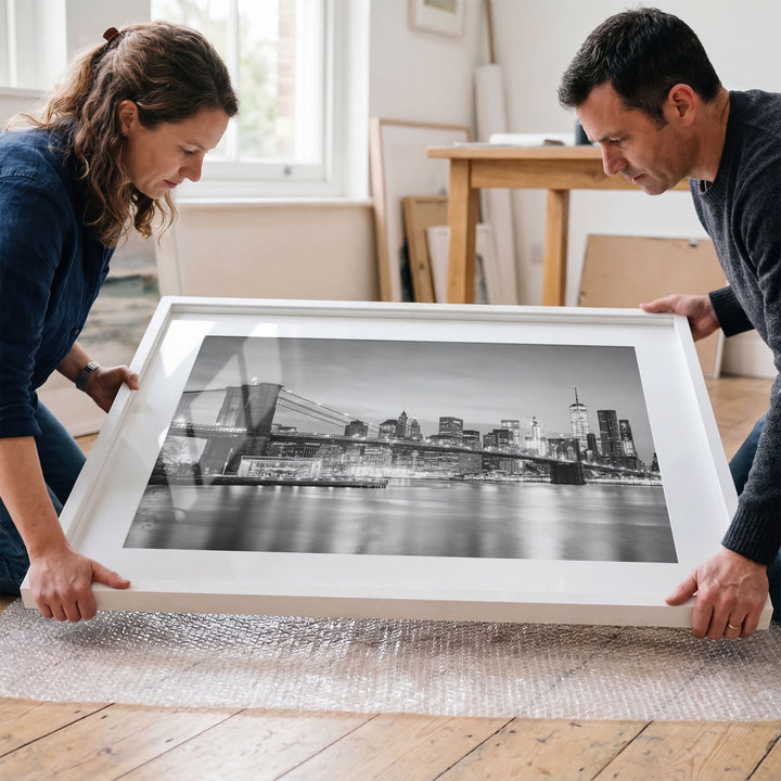 Brooklyn Bridge and Skyline at Dusk, New York City – B&amp;W framed wall art in a cozy interior