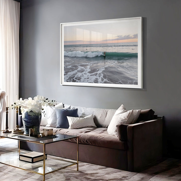 Riding the Wave at Sunset II, Costa Rica print displayed in a bedroom setting