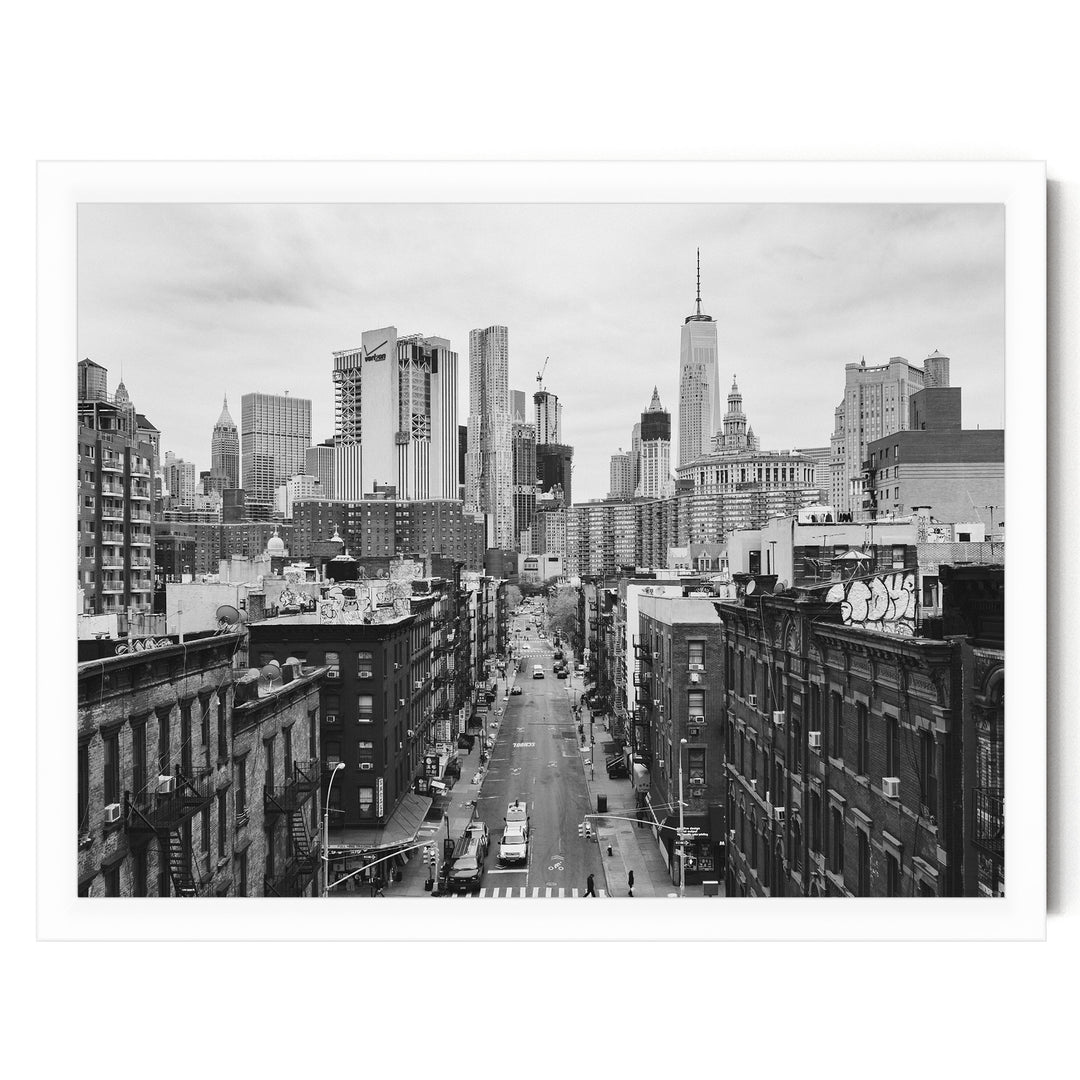 Lower Manhattan Street View, New York City – B&amp;W print in a white frame without mat