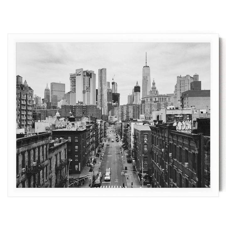 Lower Manhattan Street View, New York City – B&amp;W print in a white frame without mat