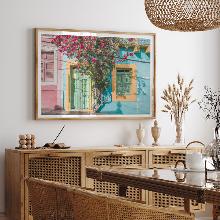 Bougainvillea and Green Door II, Olinda, Brazil framed print hanging in a styled interior