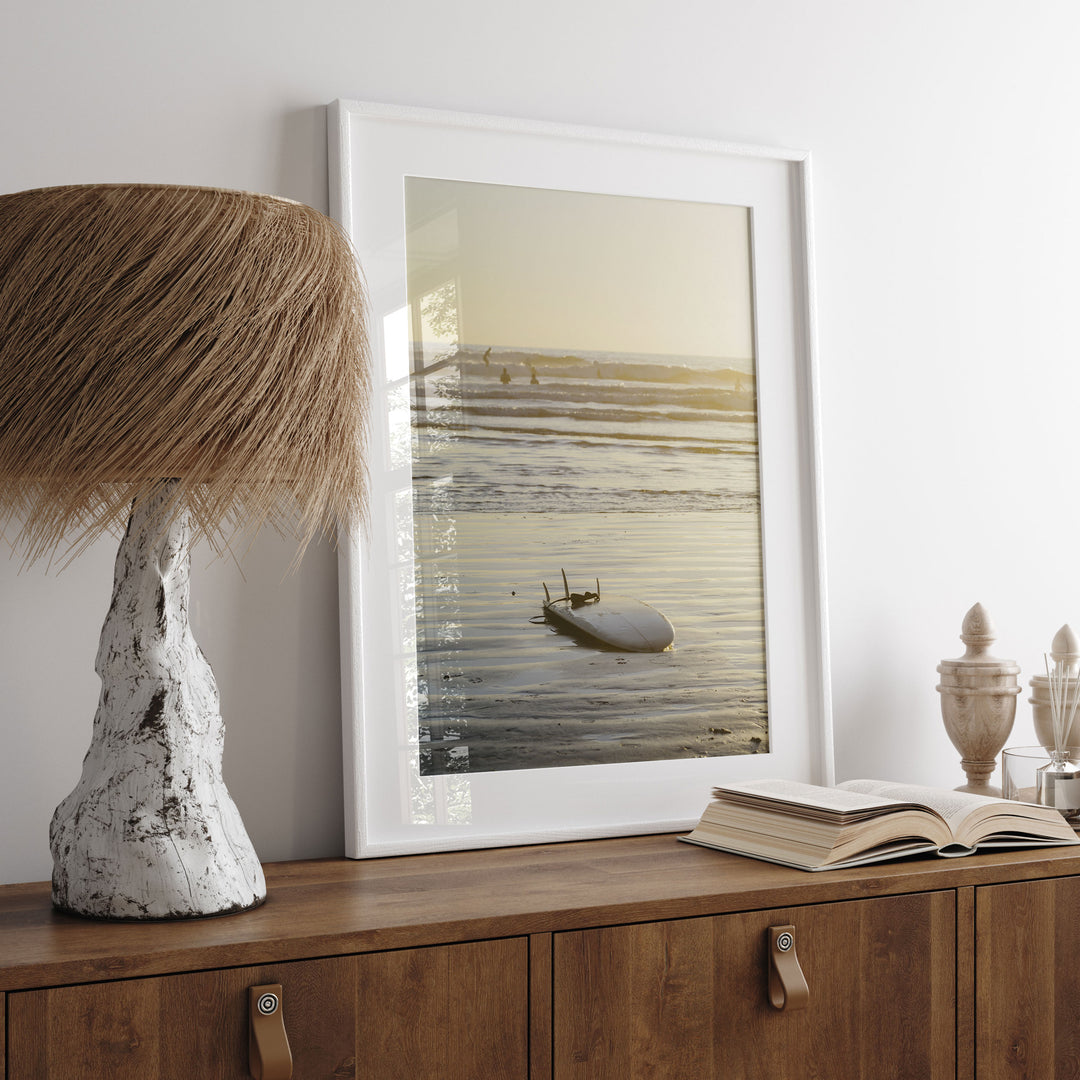 Surfboard at Sunset, Costa Rica print displayed in a bedroom setting