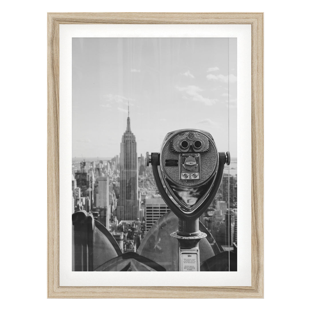 Binoculars and Empire State Building, New York City – B&W fine art print in a natural wood frame with white mat