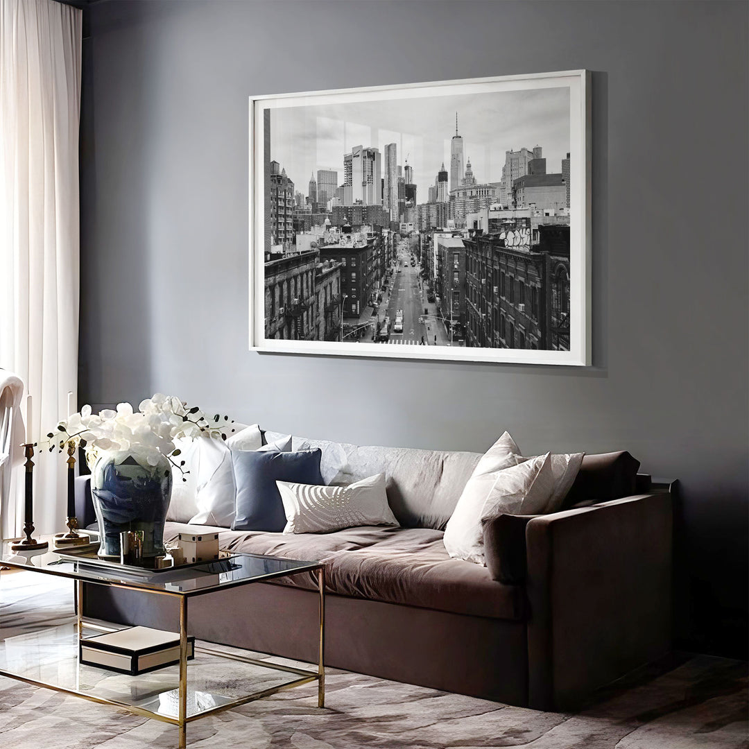 Lower Manhattan Street View, New York City – B&amp;W print displayed in a bedroom setting