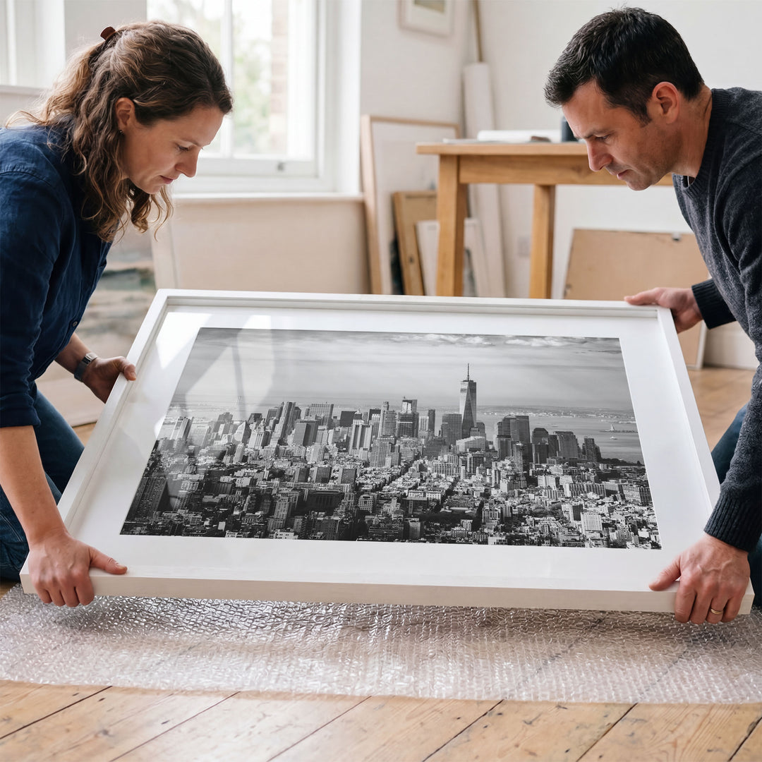 Manhattan Skyline from Above, New York City – B&amp;W framed wall art in a cozy interior