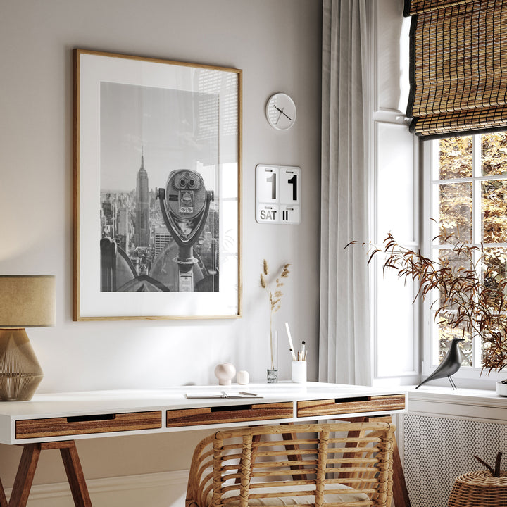 Binoculars and Empire State Building, New York City – B&amp;W framed print hanging in a styled interior
