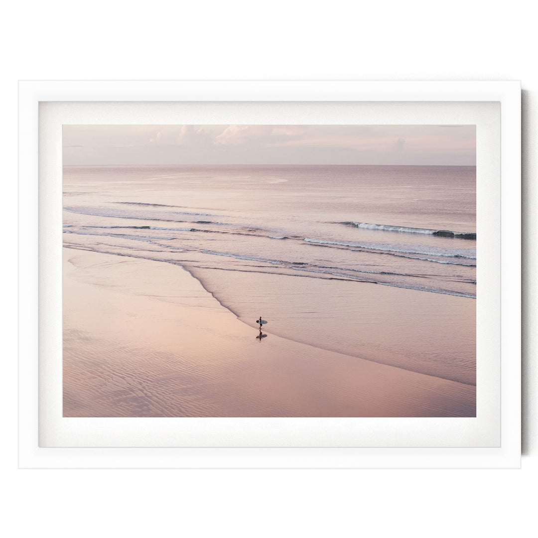 Lone Surfer on a Pink Beach I, Costa Rica print in a white frame with white mat