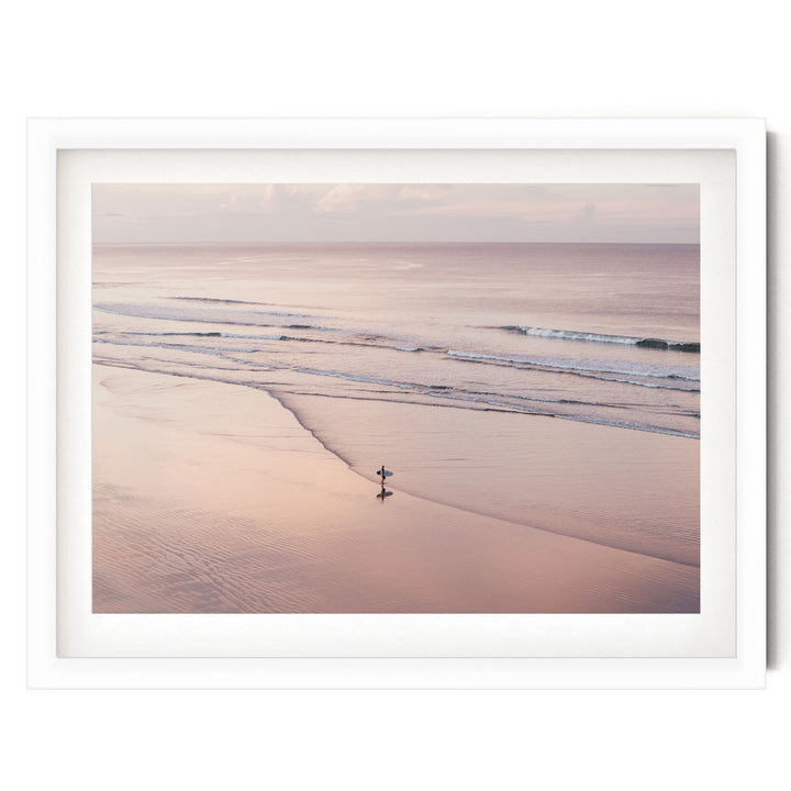 Lone Surfer on a Pink Beach I, Costa Rica print in a white frame with white mat