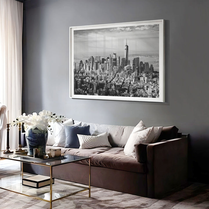 Manhattan Skyline from Above, New York City – B&amp;W print displayed in a bedroom setting