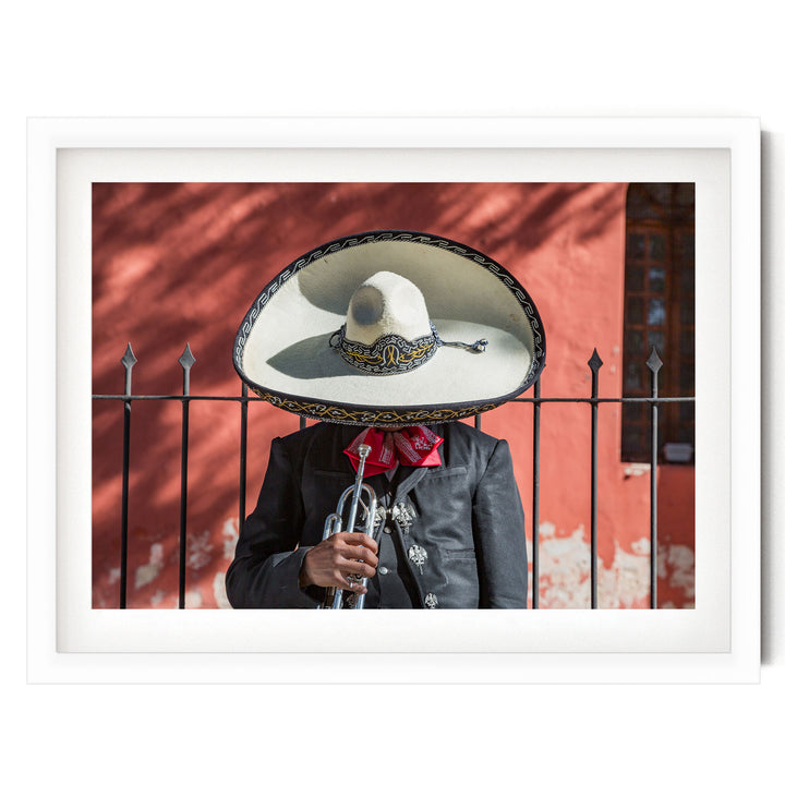Mexican charro print in a white frame with white mat