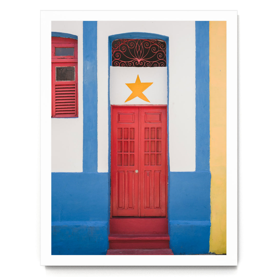 Red Door with Yellow Star, Olinda, Brazil print in a white frame without mat