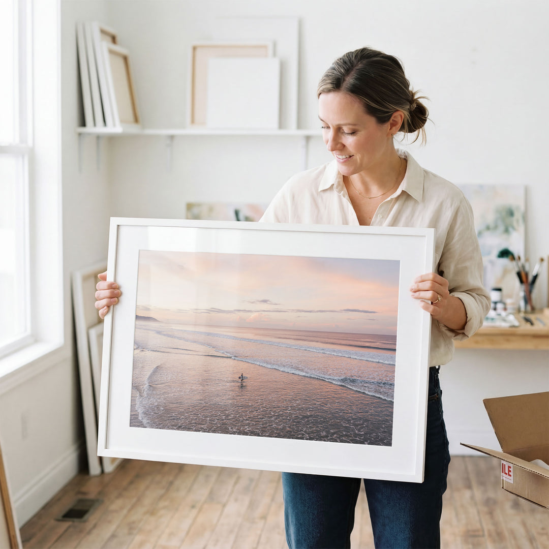 Lone Surfer on a Pink Beach II, Costa Rica wall art in a contemporary home