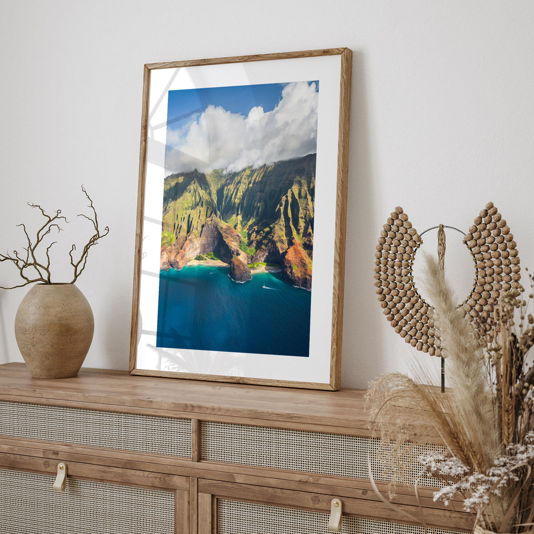 Kauai Cliffs II, Na Pali Coast, Hawaii framed print hanging in a styled interior