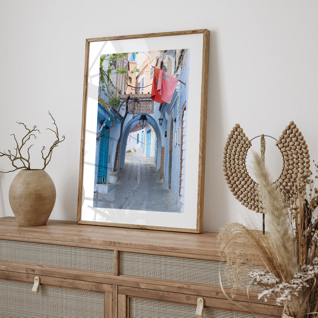 Moroccan Flag in the Blue City, Chefchaouen framed print styled on the wall