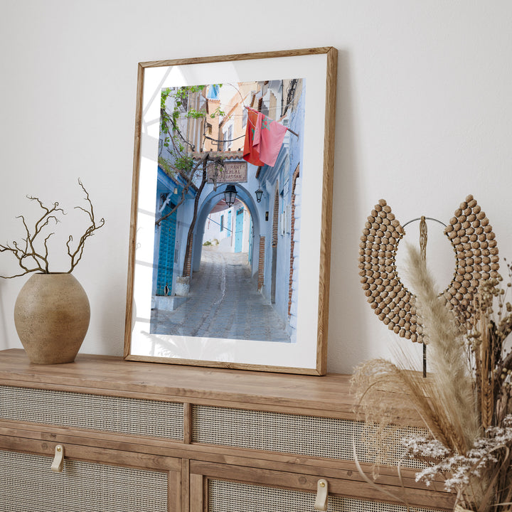 Moroccan Flag in the Blue City, Chefchaouen framed print styled on the wall
