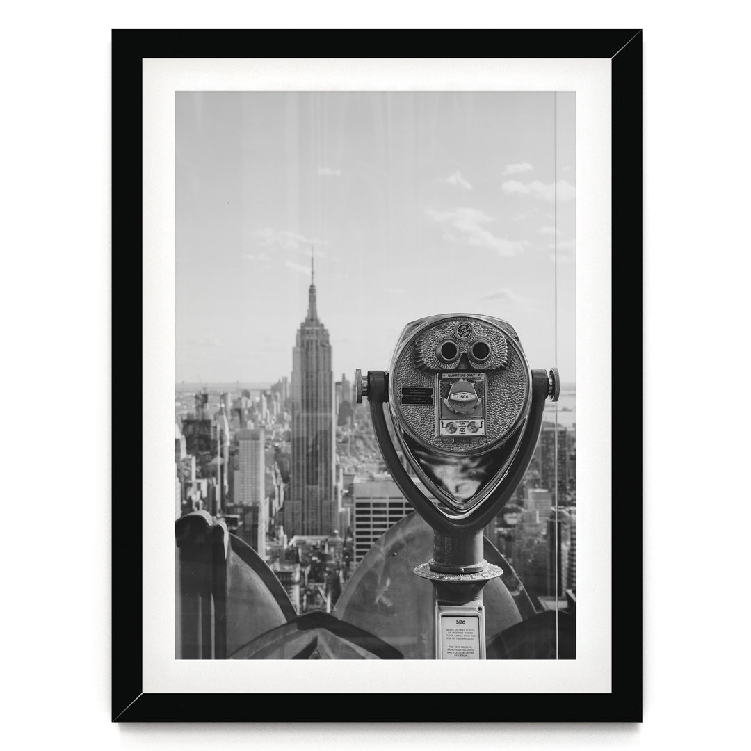 Binoculars and Empire State Building, New York City – B&amp;W print in a black frame with white mat
