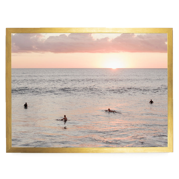 Surfers Waiting at Sunset, Costa Rica print in a gold frame without mat