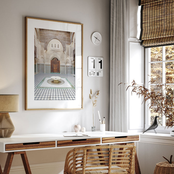 Madrasa Courtyard, Fes, Morocco framed print hanging in a styled interior