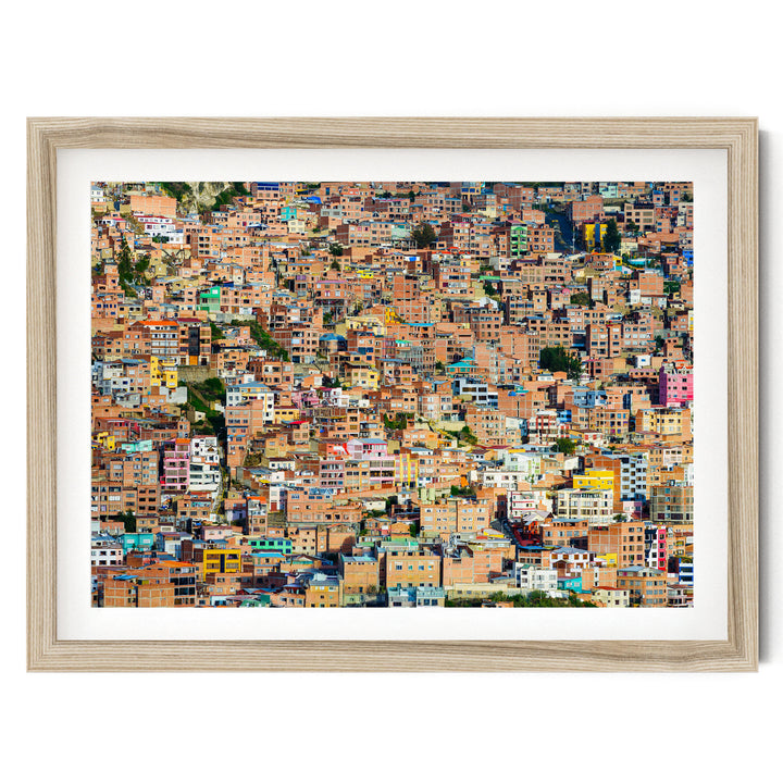 Colorful Houses of La Paz, Bolivia fine art print in a natural wood frame with white mat