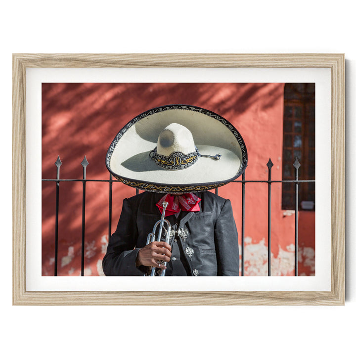 Mexican charro fine art print in a natural wood frame with white mat