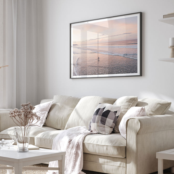 Lone Surfer on a Pink Beach II, Costa Rica framed print in a living room setting