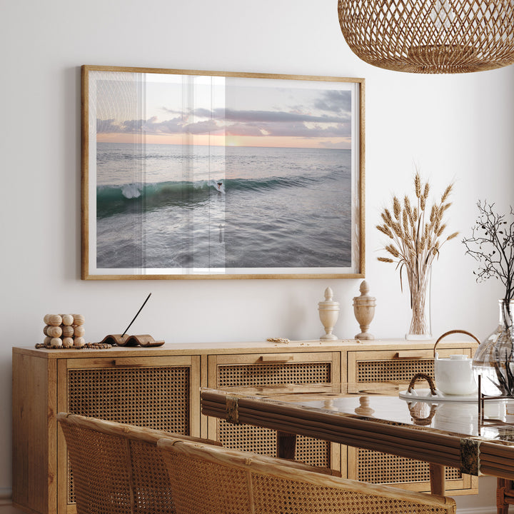 Riding the Wave at Sunset I, Costa Rica framed print hanging in a styled interior