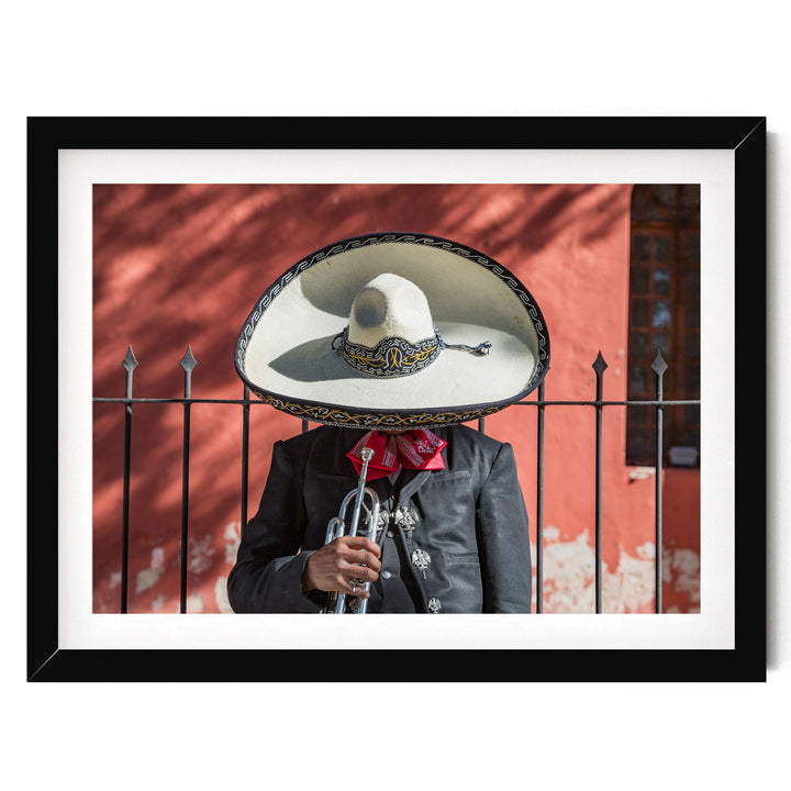 Mexican charro print in a black frame with white mat